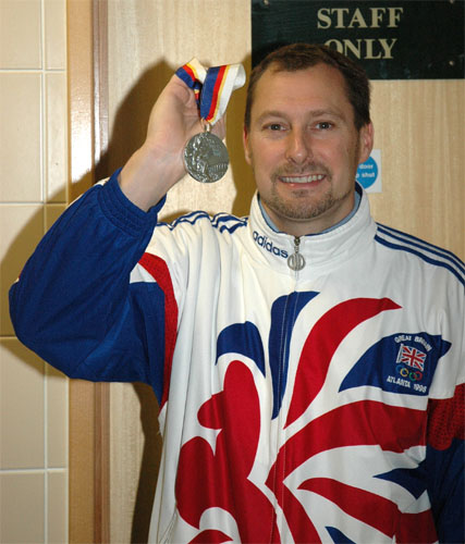 Nick Gillingham with Olympic medal